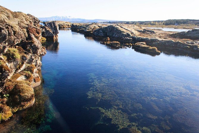 Silfra Drysuit Snorkeling Tour with Free Photos - From Reykjavik - Free photos and hot chocolate improve the finish