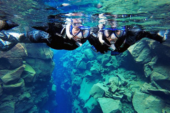 Silfra Drysuit Snorkeling Tour with Free Photos - From Reykjavik - What the $189 price really covers