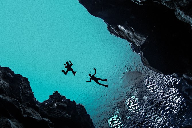 Silfra Drysuit Snorkeling with Free Photos - Meet on Location - The drysuit keeps you warm, but it is not magic