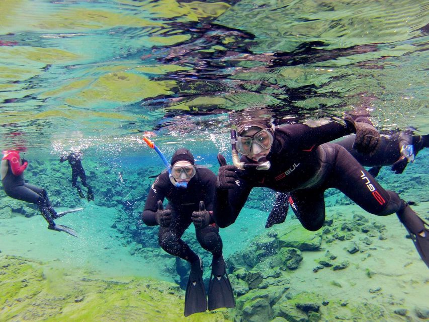 Silfra: Half-Day Snorkeling Day Trip with Underwater Photos - Photos, Hot Chocolate, and the Human Touch