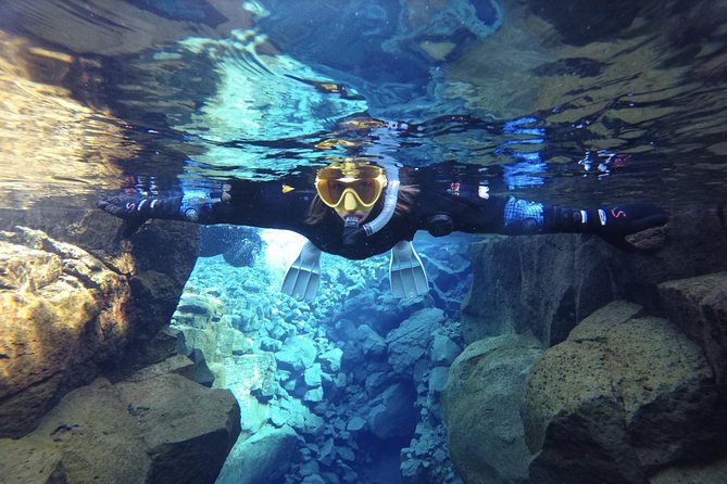 Silfra Snorkeling Between Continents Photos Included- Self Drive - Getting suited up for Icelandic water