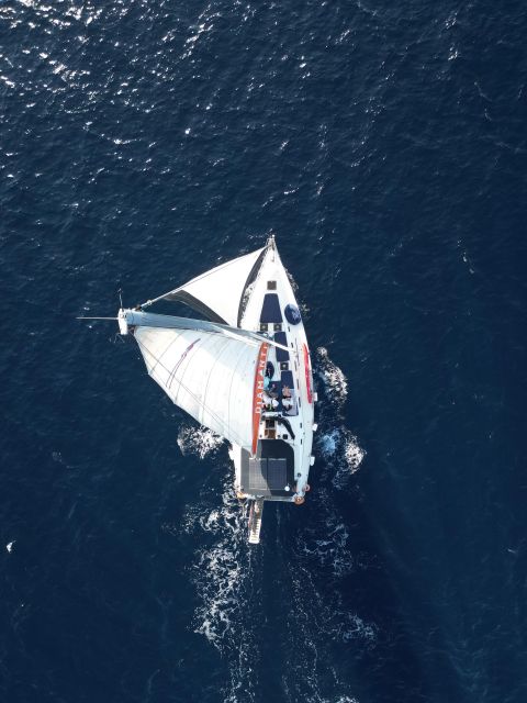 Skiathos: Private Sailing Trip with Lunch and Snorkeling - Sailing across to Kastani Beach on Skopelos