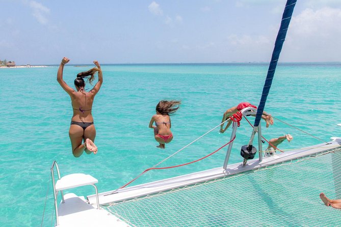 Snorkeling Adventure at Isla Mujeres Includes Lunch and Open Bar - Snorkeling near the reef and underwater museum