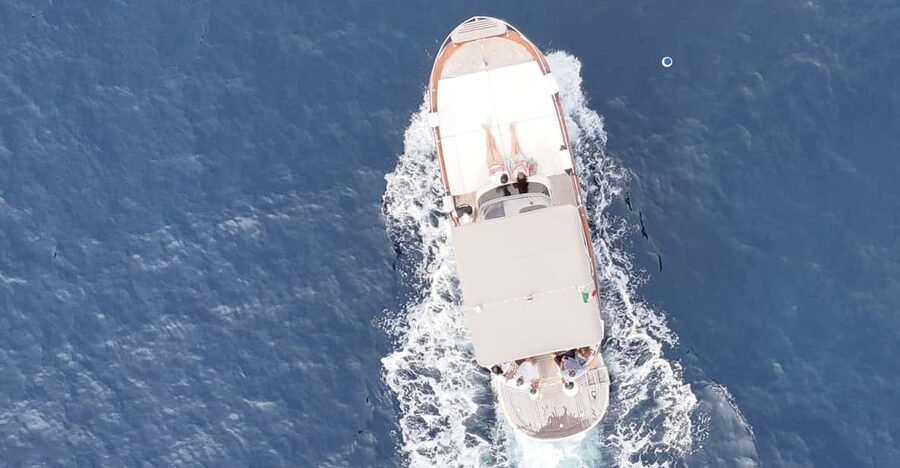 Sorrento: Capri and Blue Grotto Yacht Tour with Snorkeling - Circling Capri by yacht