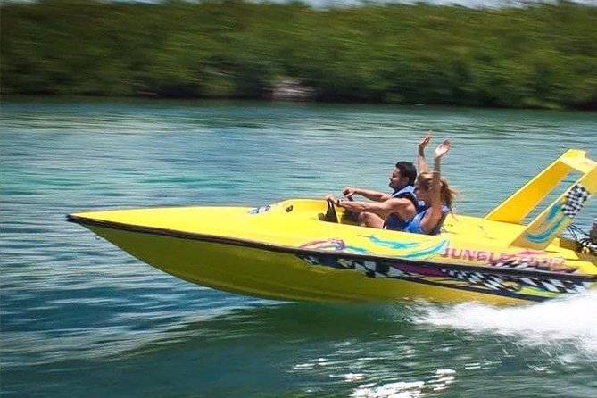 Speedboat jungle tour and snorkel - Driving through Cancun’s lagoon and mangroves