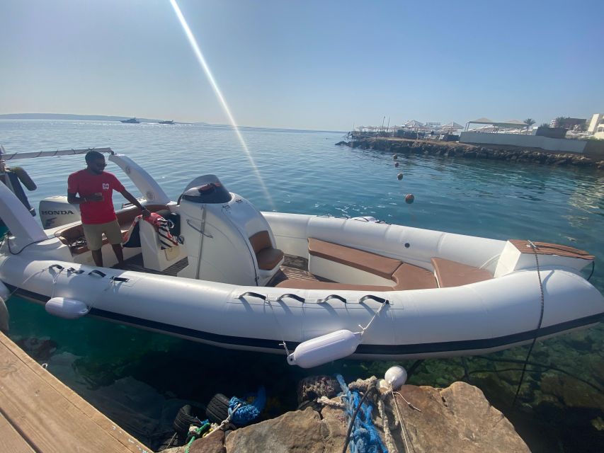 Speedboat,Parasailing, Snorkeling & Piece Of Paradise Island - Parasailing above the coral water