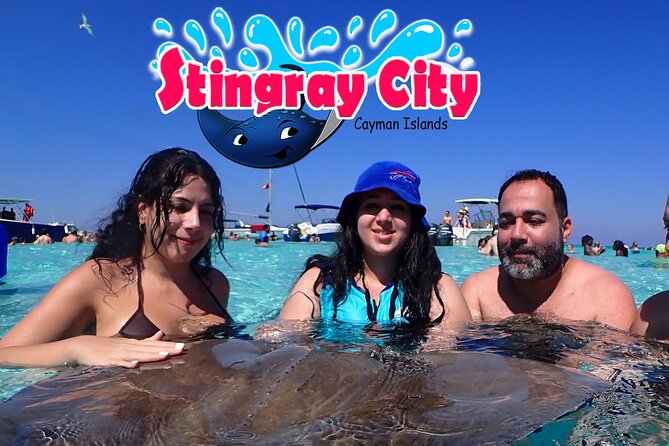 Stingray City and Starfish Experience with Coral Reef Snorkeling - Reaching Stingray City in shallow water