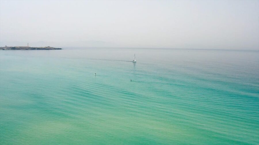 Tarifa: Sailboat Tour, Snorkelling, Tapas & Drinks - The people make the small boat work