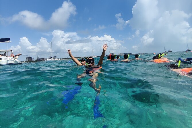 Top Isla Mujeres Catamaran Tour with Snorkel Open Bar and Buffet lunch - What kind of day this really is
