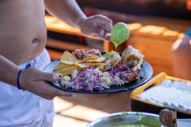 Treasure Hunt Snorkeling Lunch Cruise from Cabo San Lucas - Lunch on deck: burritos, salads, and guacamole