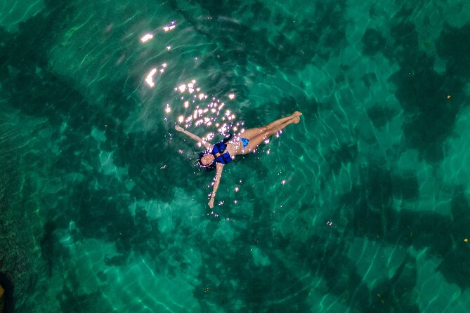 Tulum Guided Tour, Magical Cenote, Lagoon Snorkeling and Beachside Lunch - Yal Ku Lagoon offers easy snorkeling in mixed water