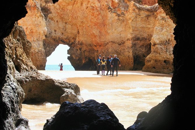 Visit Secret Caves, Hidden Beaches and Snorkel in Alvor, Portugal - Swimming into the caves