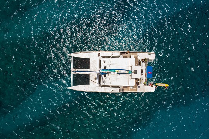 Waikiki Catamaran Snorkel Sail with Lunch: Turtles Guaranteed - Returning aboard for lunch, drinks, and dry clothes