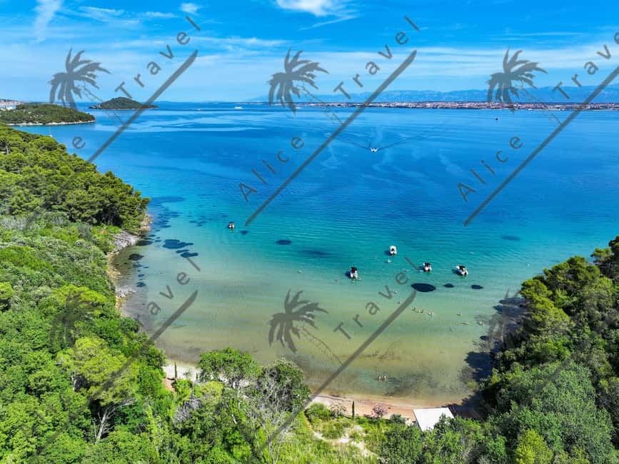 Zadar: 3 Island Speedboat Tour with Wine and Snorkeling - Kostanj Bay: your first swim in clear water