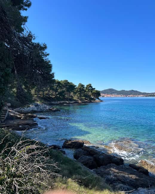Zadar: 3 Islands SpeedBoat Tour with Snorkeling and Drinks - Stop one: a quiet bay for swimming and snorkeling